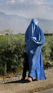 Woman wearing her compulsory a burqa in Taliban Afghanistan.